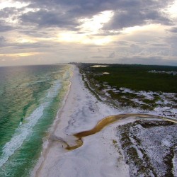 visit-florida:  A coastal dune lake flows
