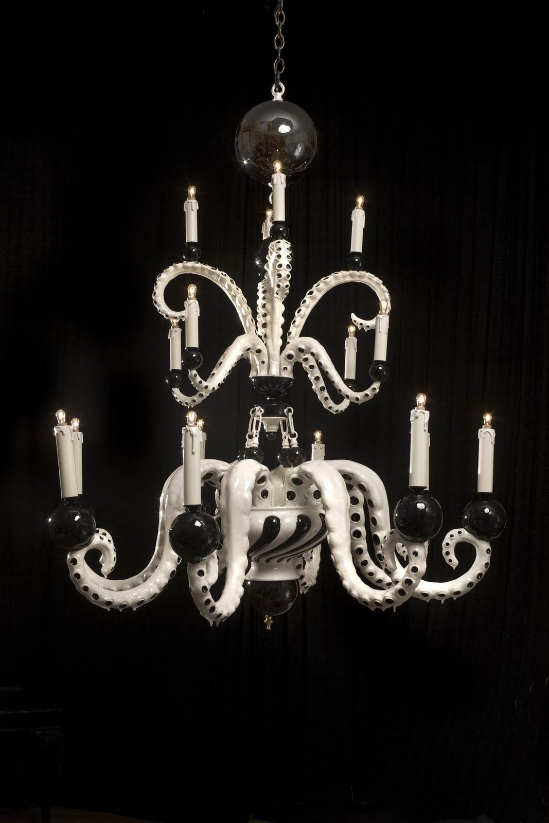 lady-grae:  staceythinx:  Octopus chandeliers by Adam Wallacavage  I think I need