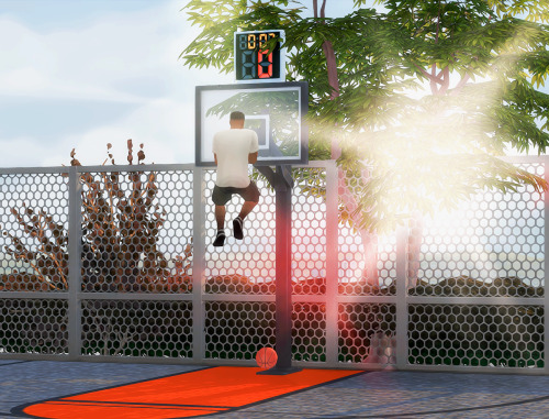 Testing out the the basketball court that I built for him in the backyard