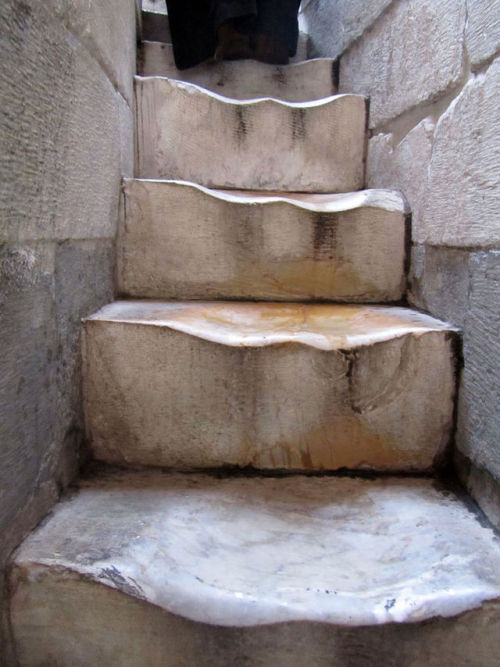 sixpenceee: The worn marble steps at the Leaning Tower of Pisa. This is the result of 500 years of w