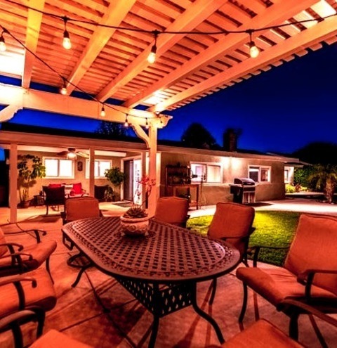 Pool Landscaping In Los AngelesImage Of A Medium-sized Farmhouse Backyard With Stamped Concrete And A