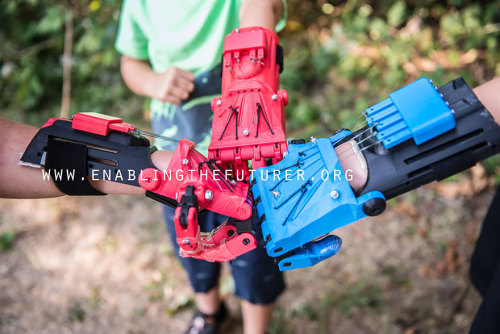 dreamychocolateprincess:  cubebreaker:  E-Nabling the Future is an organization of volunteers who produce 3D-printed prosthetic superhero arms for kids in need.  i smiled so hard 