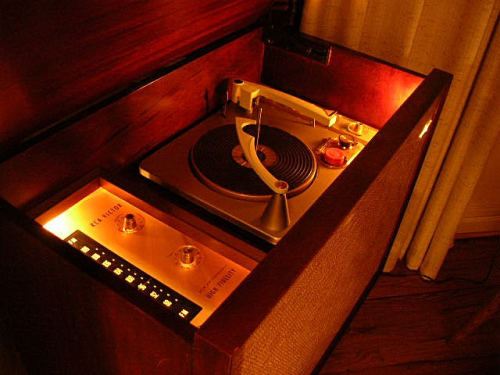 This console is a 1958 RCA SHP-9. It has a twin cabinet for the left channel speakers. This was the first year for stereo phonographs. Each channel of the amplifier has three AF amp stages and a single ended 6V6 output stage. The left and right output