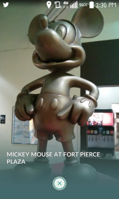 This Mickey Mouse statue is a Pokemon Gym
