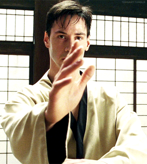 Keanu Reeves As Thomas Anderson/Neo THE MATRIX (1999), Dir. The Wachowskis