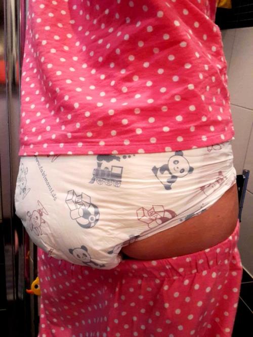   I’m wearing bunny & panda diapers in my PJs (7 pics)  Have you ever seen bunny & panda diapers? They’re made by Fabine. I’m all diapered up and ready for a nap :-)See 7 cute pics on my website:http://abdlgirl.com/2015/11/13/im-wearing-bunny-pand