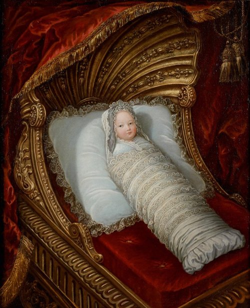 dorfs:le-rococo-en-versailles:A swaddled infant in a shell-shaped cradle. French School, c.1700.me a