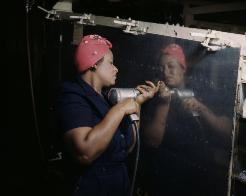 February 1943: A worker drills rivets on an A-31 “Vengeance” dive bomber at the Vultee f
