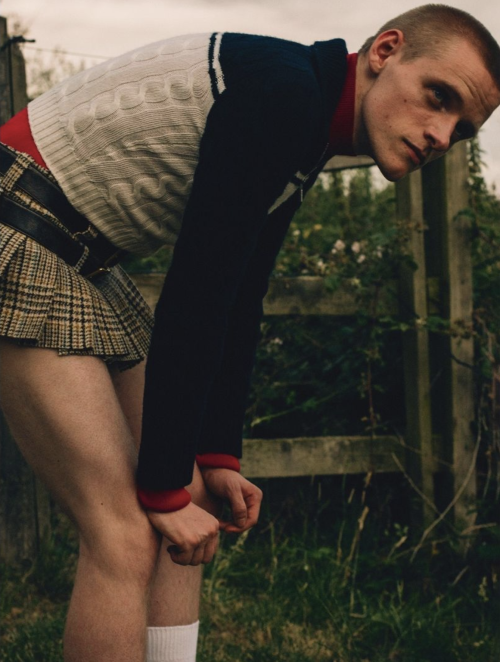 colin-crossing:  LEWIS GRIBBEN in a MIU MIU mini skirt, jumper and red DUNHILL rollneck for Fantastic Manphotographed by ROBBIE LAWRENCE and styled by STUART WILLIAMSON