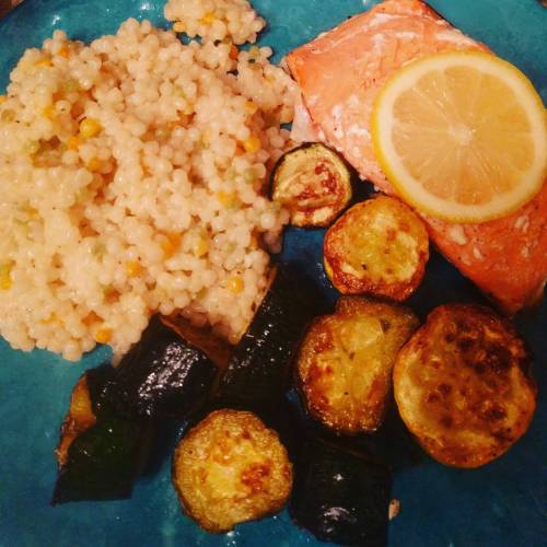 Kicking it up a notch tonight: lemon baked salmon in foil, parmesan couscous, and roasted zucchini a