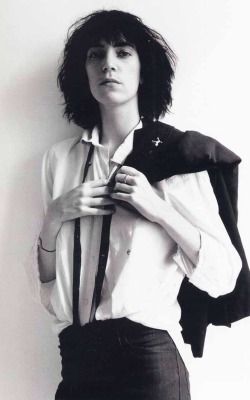 you-belong-among-wildflowers:   1970’s Style Icons : Patti Smith ↳“I know fashion is a material thing but we live in a material world and I love clothes. My style says ‘look at me, don’t look at me.’ I just really don’t care what you