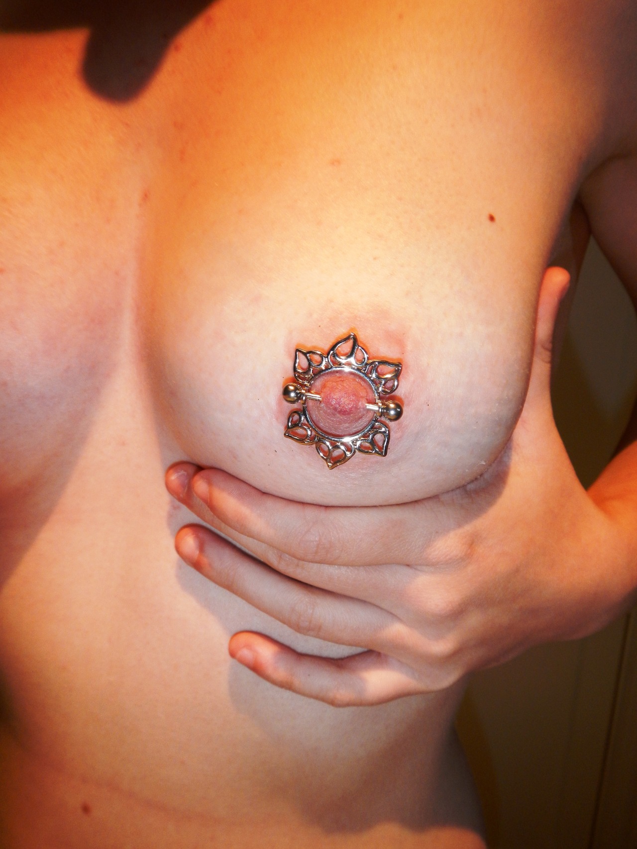 fuckingbrighteyes:  hello to my nipple on my dash