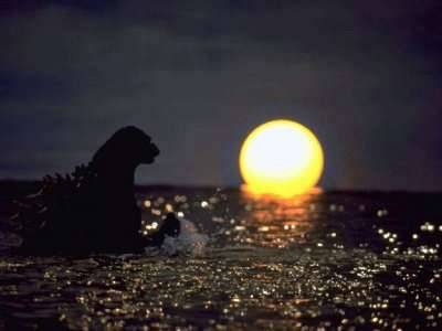 atomic-crusader: Godzilla swimming off into the sunset at the end of Godzilla Vs. SpaceGodzilla (199