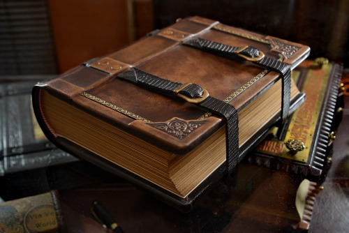  Medieval styled and aged leather journal with straps and buckles.8" x 10" large, 3" 