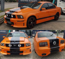 awesomecarmods:  Four door Mustang, based on a Aussie BA Falcon [ https://i.imgur.com/eWOKM9o.jpg ]