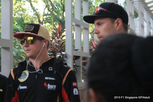 Kimi Raikkonen Heads out the Paddock during 2013 Singapore GP on race day.