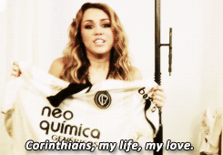 fullscircle:  Miley with uniforms of some brazilian soccer clubs. 