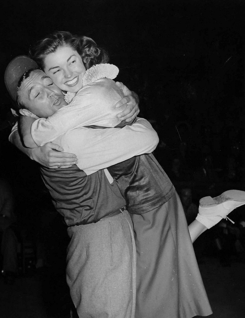 robert-mitchum: Robert Mitchum hugs Esther Williams at the 2nd annual “Out of This