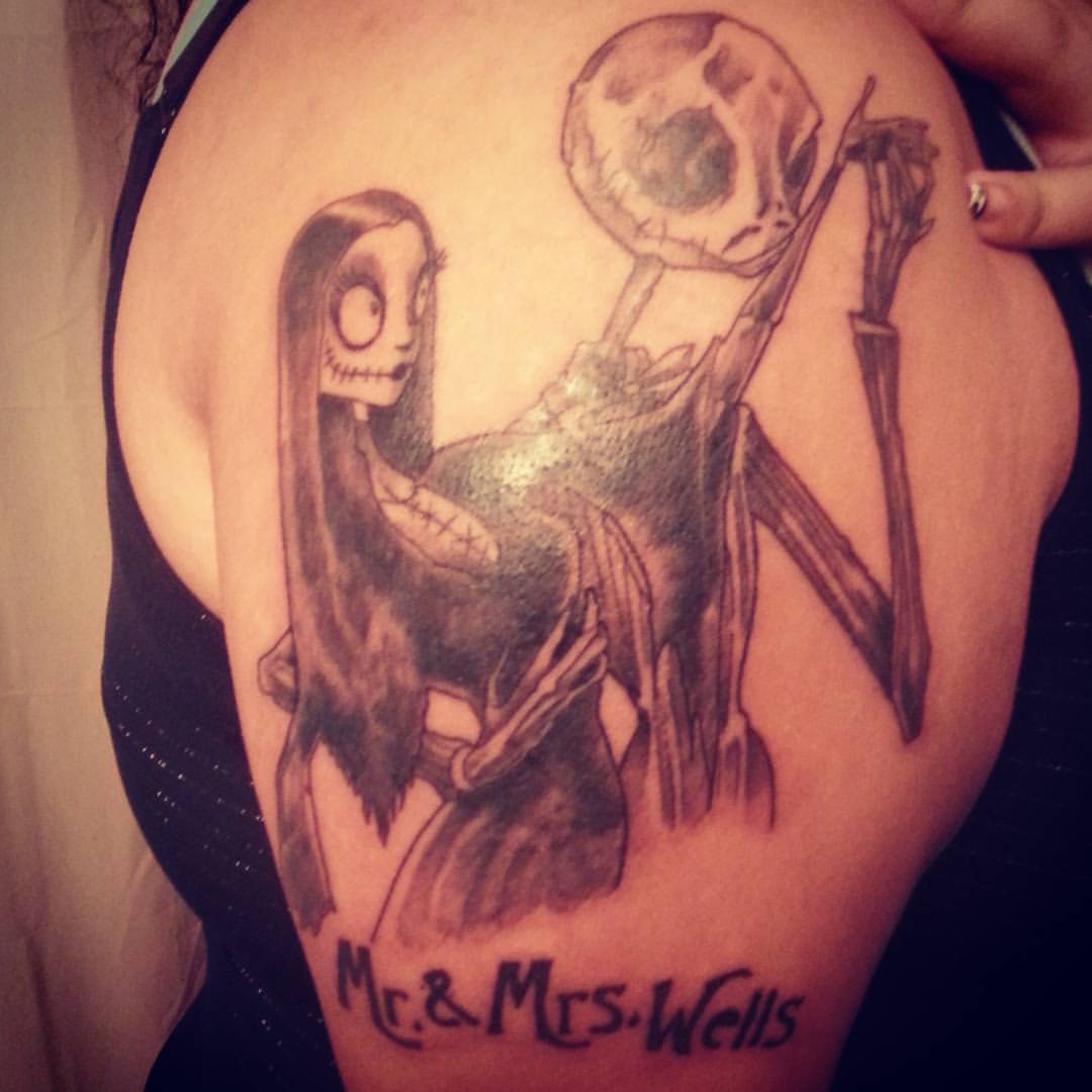 Gomez and morticia tattoo