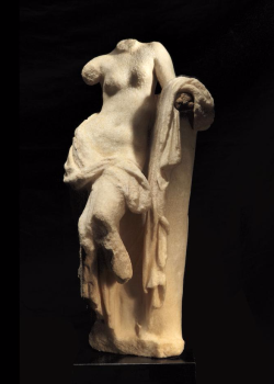 mini-girlz:  A Greek marble figure of Aphrodite  Hellenistic Period, circa 2nd Century B.C. The goddess depicted standing with her weight on her right leg, her left knee relaxed, with sinuous curved torso, the drapery falling in folds around her lower