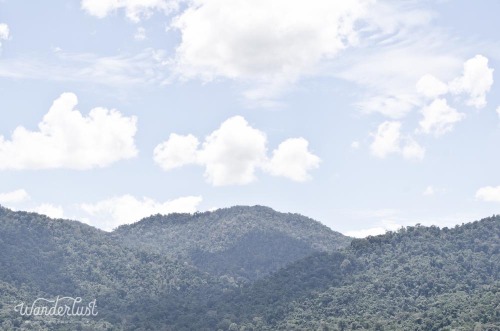 the-wanderlustproject:  These uniquely Malaysian hills and cliffs loomed the country.  Any big metropolitan city seemed to be a bunch of buildings and houses in the middle of a jungle.