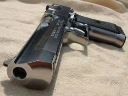 weaponslover:  Nothing says fuck you quite like a .50 Caliber Desert Eagle.