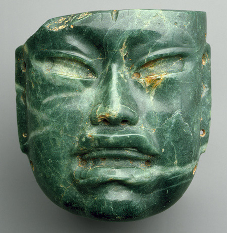 An arresting Olmec jade mask, from the 900s - 400s BCE