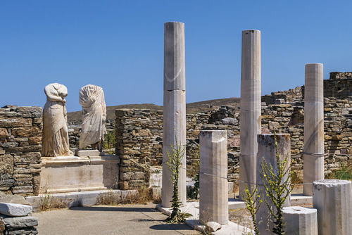 Remains of the House of Cleopatra in Delos, Greece. Two statues of the owners of the house greet the