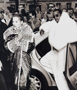 midnight-charm:  “Puffy takes Paris” Kate Moss wearing leopard-print coat by Emanuel Ungaro Haute Couture &amp; Sean Combs photographed by Annie Leibovitz for Vogue US October 1999   Stylist: Grace Coddington Hair: Julien D'YsMakeup: Diane Kendal