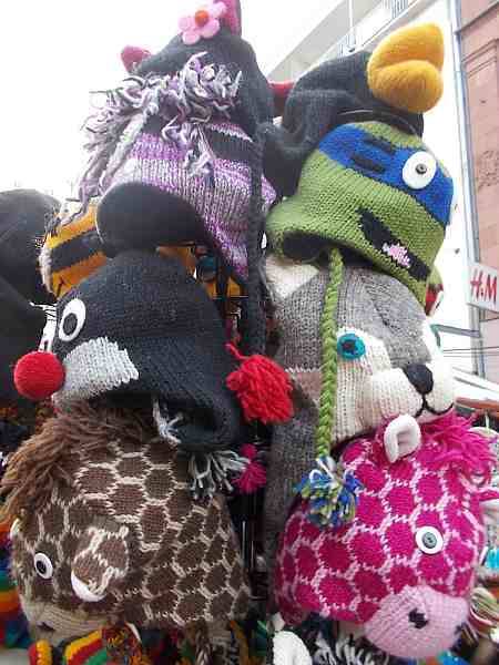 Various clothes for winter offered during Christmas market 2021 in the city Wroclaw, Poland.