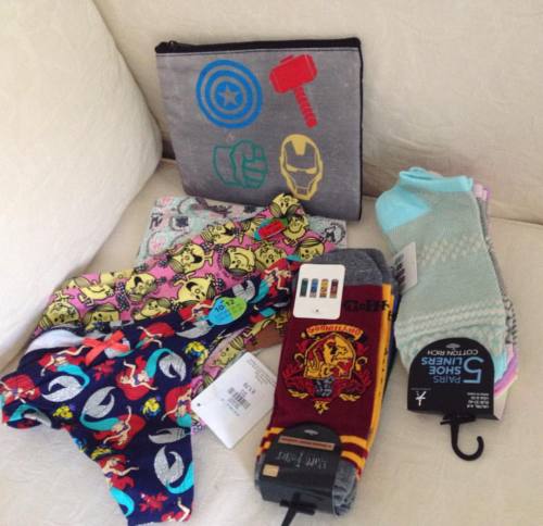 lost-lil-kitty:  My Primark goodies today (also got a boring handbag for the wedding and travel pots to put my shampoo in). Favourites here are the Hogwarts house socks! Little mermaid thong! And avengers pencil case which will now be my makeup case (as