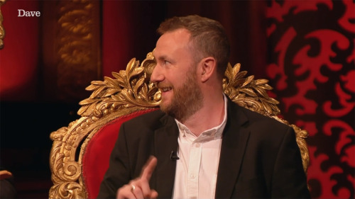 taskmastercaps:[ID: Four screencaps from Taskmaster. Greg Davies is seated next to Alex Horne, holdi