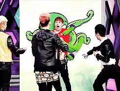 0488:  donghae and henry acting like total boyfriends on happy camp.        
