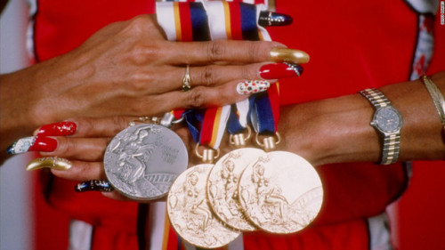 blkbutterfly816:  blackbonniex:  Flo Jo R.I.P. Queen  Still the baddest in track and field! 20+ years and her records remain unbroken!    She always had the flyest nails 💅 