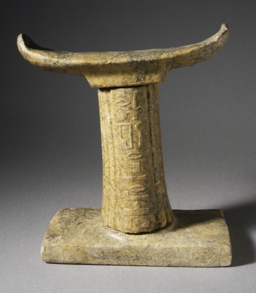 Ancient Egyptian funerary headrest, carved from granite.  Artist unknown; 5th Dynasty (ca. 2513
