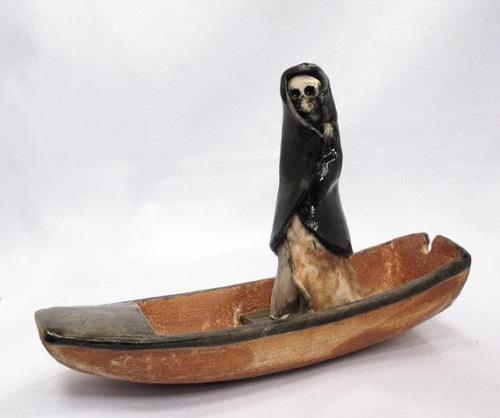blackpaint20:Little ceramic sculpture of Death on his riverboat, (echong the Classical greek Charon 