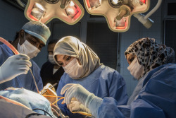 unrar:  Female surgeons operate in Al-Jalla Hospital, Libya. George Steinmetz.  