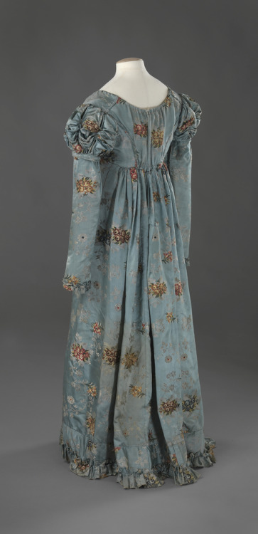 Silk brocade dress from the 1820sIf looking closer, it becomes clear the hem is a patchwork of scrap