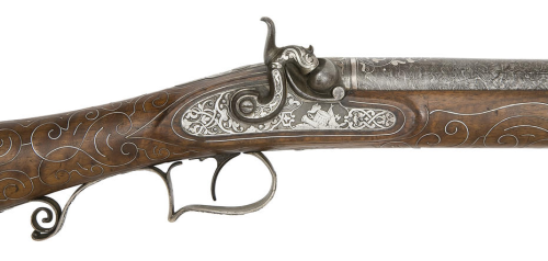 A silver inlaid Belgian percussion musket decorated in Eastern style, mid 19th century.