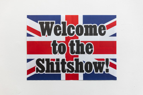 Jeremy DellerWelcome to the Shitshow, 2019Poster insertCourtesy the Artist, The Modern Institute/Tob