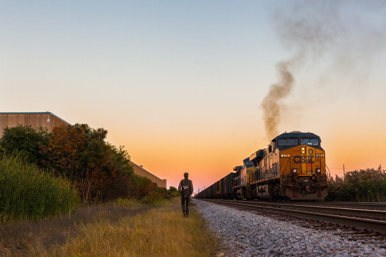 gregwasout:  Shea hopping on a freight train. Chicago, Illinois. September 2013.