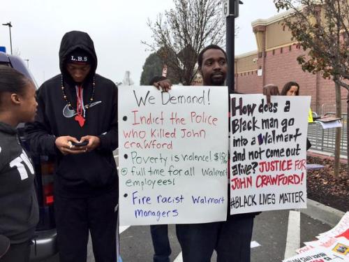 america-wakiewakie:  Oakland Community Demands Justice for John Crawford III at East-Side Walmart | AmericaWakieWakie January 18th, 2015 Pictured: John Crawford, 22, was shot and killed Aug. 5th by police in the Dayton suburb of Beavercreek, Ohio, while h