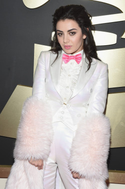 reverseracist:  twinkvogue:  :February 8: [More] Charli attends The 57th Annual GRAMMY Awards at the LA STAPLES Center  gawd  WHAT IS SHE WEARING????