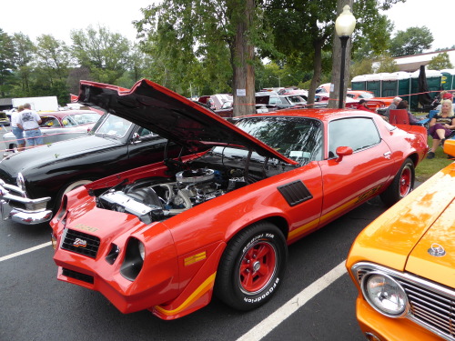 swagomotive:  fromcruise-instoconcours:  Chevy Camaro Z28, peak ‘70′s flashiness.     Mom had a weird 81 berlinetta that had the scoop and front ground effects and silly fake vent on the side but no decals or extra badging. Z28 mags as well that I