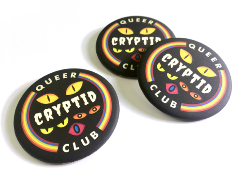 toast charms, pronoun buttons, queer cryptid badges (always needed), and carnivorous plant pins are 
