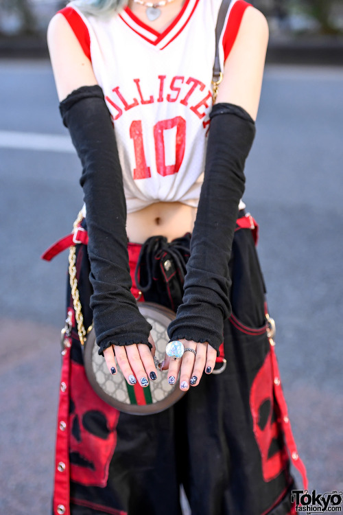 19-year-old Japanese student Nana on the street in Harajuku wearing a Hollister crop top she got fro