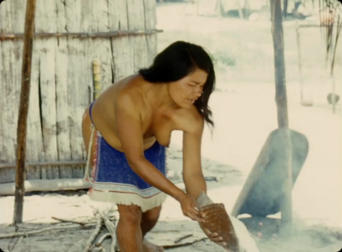   Guyanese woman preparing cassava, from adult photos