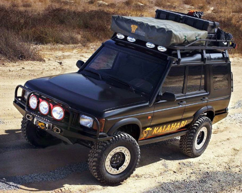 carsthatnevermadeitetc:  Land Rover Discovery Series II Kalahari Concept, 2001. A prototype presented at the SEMA show that was prepared by Safari Guard. In addition to the suspension lift and Centerline wheels it featured a Hannibal roof tent and an