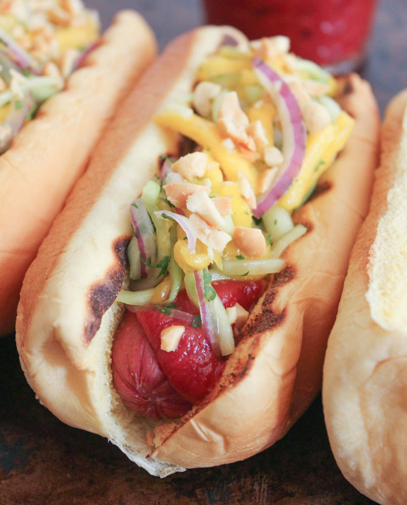 craving-nomz:  Thai Hot Dogs with Cucumber Mango Slaw and Sriracha Ketchup