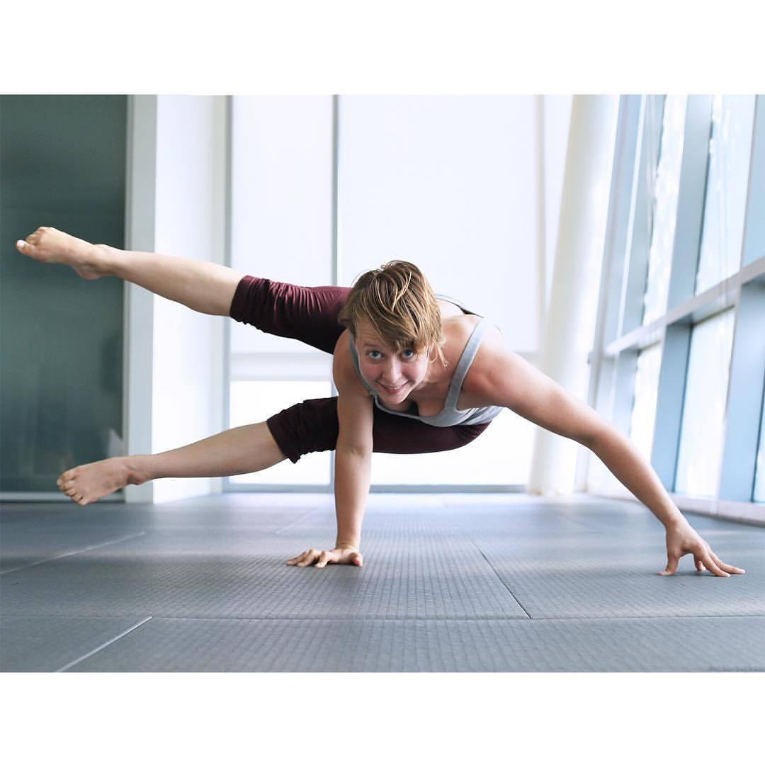 yogogirls:  This little firecracker is Christine Kick -asana. She’s an acro master